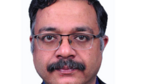 The photo shows Manish Jain