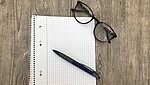 Schreibblock mit Stift